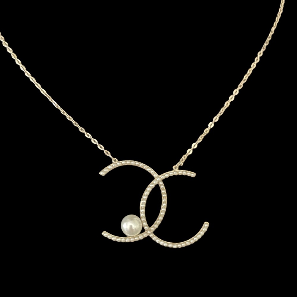 CC  with pearl necklace